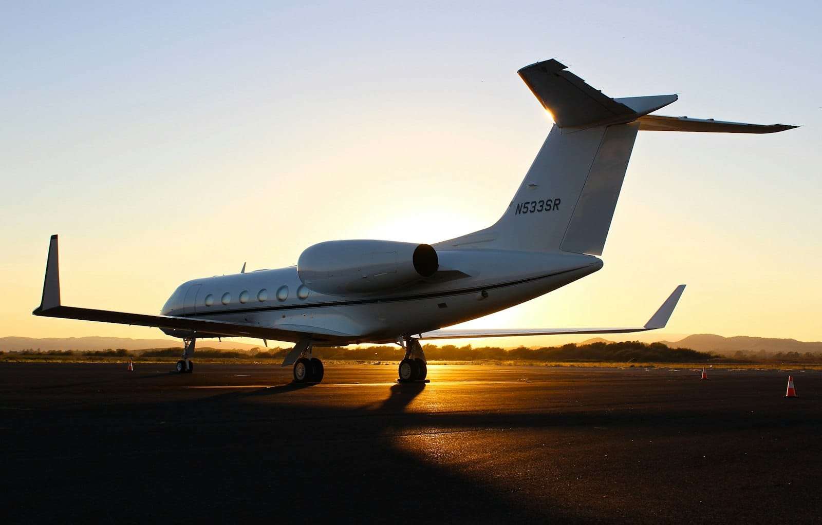 A light jet repositioning at dawn, empty cabin