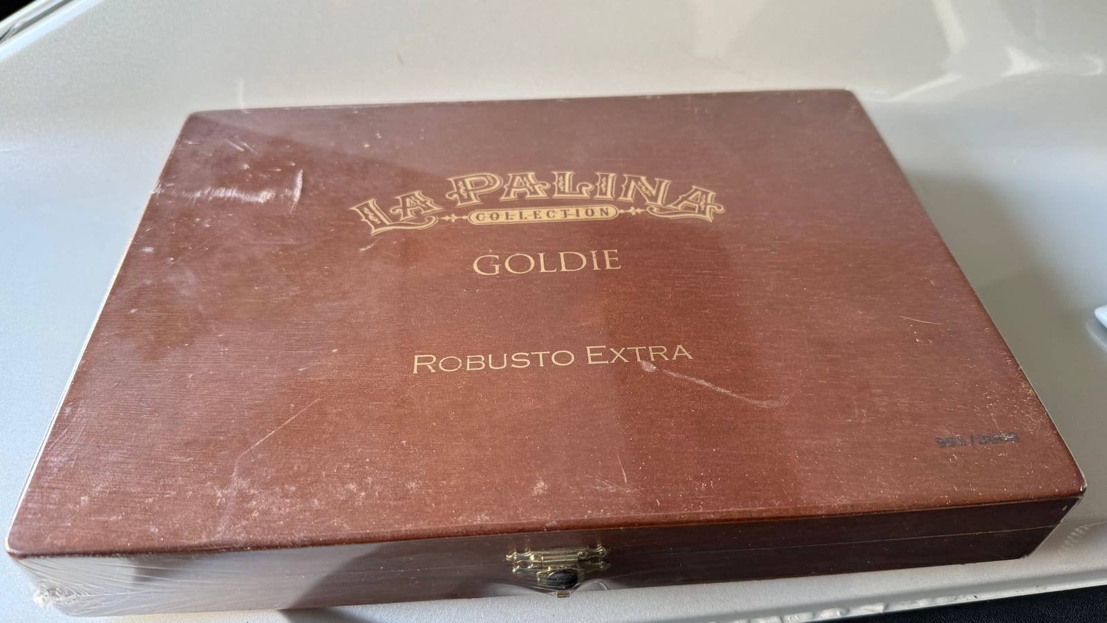 Aged boxes with intact seals, a collector's shelf